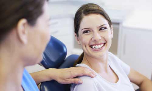 bonding-woman-in-dental-chair-smiling